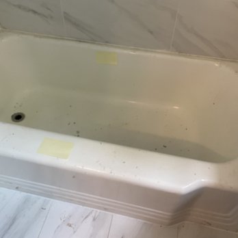 ABT Home Services - Damage to bathtub. All scratches and dents were caused by ABT Home Services. The contract said specifically to salvage the tub. - General Contractors Near Me