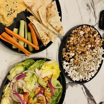 Quail State - Humus, strawberry salad and popcorn - Cocktail Bars Near Me - Fresno, California