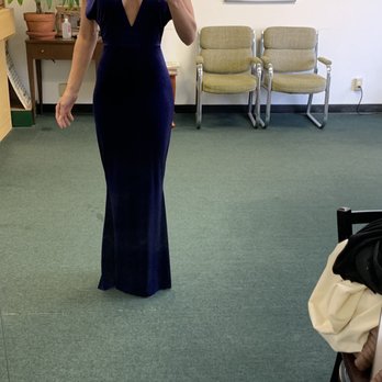 Our Custom Tailor - Fixed the length and left the small train. Changed elastic in the waist and fixed the two holes. - Sewing & Alterations Near Me - Dallas, Texas