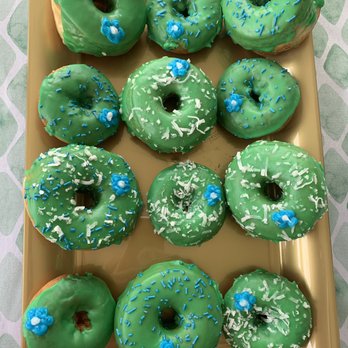 Doughboys Donuts - Pre ordered custom green frosting donuts they added some blue for a baby shower like we requested. Very happy with result. - Donuts Near Me - Reno, Nevada Doughboys Donuts - Pre ordered custom green frosting donuts they added some blue for a baby shower like we requested. Very happy with result. - Donuts Near Me - Reno, Nevada