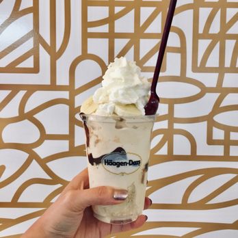 Häagen-Dazs - a hand holding a cup of ice cream - Ice Cream & Frozen Yogurt Near Me - San Mateo, California