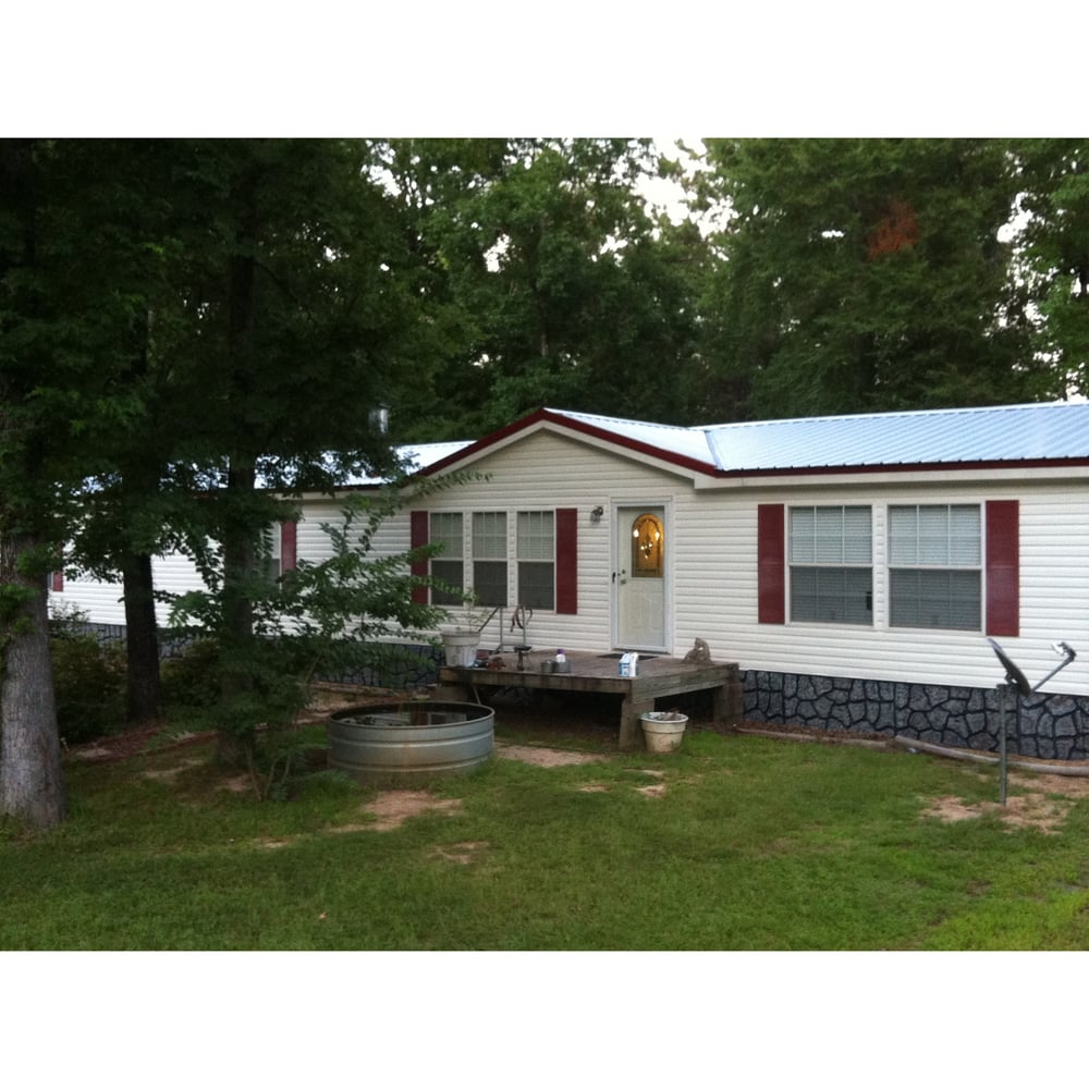 Slide of Shields Metal Roofing