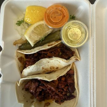 Taqueria El Maiz - Pastor tacos with grilled onions and jalapeno. The red and the green sauce are great - Mexican Near Me - Forney, Texas Taqueria El Maiz - Pastor tacos with grilled onions and jalapeno. The red and the green sauce are great - Mexican Near Me - Forney, Texas