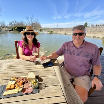 Bianchi Winery and Tasting Room - Charcuterie board, seating and lake. - Wine Tasting Room Near Me - Paso Robles, California Bianchi Winery and Tasting Room - Charcuterie board, seating and lake. - Wine Tasting Room Near Me - Paso Robles, California