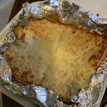 Hup's Pizza - a cheese pizza in foil - Pizza Near Me - Milwaukee, Wisconsin Hup's Pizza - a cheese pizza in foil - Pizza Near Me - Milwaukee, Wisconsin