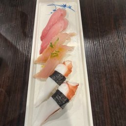 2 Pieces Yellowtail Sushi, 2 Pieces Octopus Sushi, 2 Pieces Cajun Tuna Sushi 2 Pieces Yellowtail Sushi, 2 Pieces Octopus Sushi, 2 Pieces Cajun Tuna Sushi