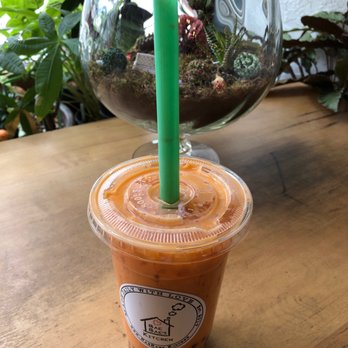 Bae Bae's Kitchen - Thai iced tea with adorable terrain behind it do you see the little hedgehog? - Korean Near Me - Pittsburgh, Pennsylvania