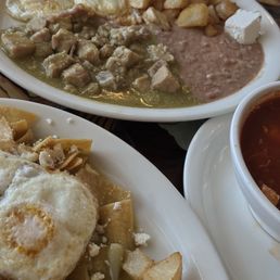 Green chilaquiles and chili ceder breakfast plates Green chilaquiles and chili ceder breakfast plates