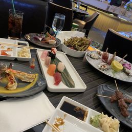 The spread. Shrimp and beef skewers, sushi combo, live shrimp sushi, fresh oysters, and Japanese shoestring fries. The spread. Shrimp and beef skewers, sushi combo, live shrimp sushi, fresh oysters, and Japanese shoestring fries.