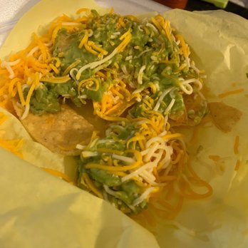 Taco Star - a taco covered in cheese and guacamole - Mexican Near Me - Aurora, Colorado