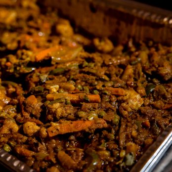 India Gate - a pan of food on a stove - Indian Near Me - Austin, Texas