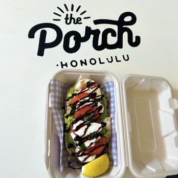 The Porch Honolulu - Caprese Toast - Sliced fresh mozzarella and tomatoes over avocado toast, with fresh basil leaves and topped with a balsamic drizzle. - Coffee & Tea Near Me - Honolulu, Hawaii The Porch Honolulu - Caprese Toast - Sliced fresh mozzarella and tomatoes over avocado toast, with fresh basil leaves and topped with a balsamic drizzle. - Coffee & Tea Near Me - Honolulu, Hawaii