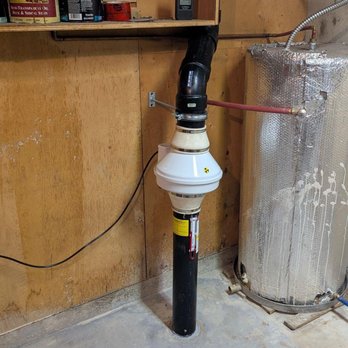 Radon Boss - Radon reduction system hard at work. - Environmental Testing Near Me Radon Boss - Radon reduction system hard at work. - Environmental Testing Near Me