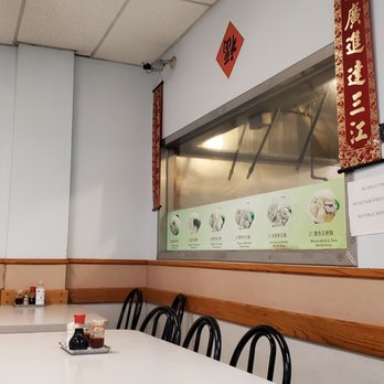 Canton Wonton House - a table and chairs in a restaurant - Cantonese Near Me - Seattle, Washington Canton Wonton House - a table and chairs in a restaurant - Cantonese Near Me - Seattle, Washington