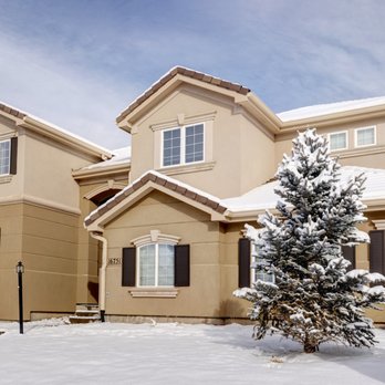 VAMP Stucco - a house with a tree in the front yard - General Contractors Near Me - Englewood, Colorado VAMP Stucco - a house with a tree in the front yard - General Contractors Near Me - Englewood, Colorado