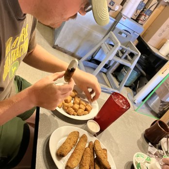 Pickle's Place - a man preparing a meal - Burgers Near Me - Arco, Idaho