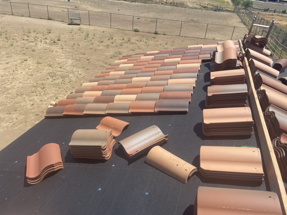 Slide of Monarch Roofing