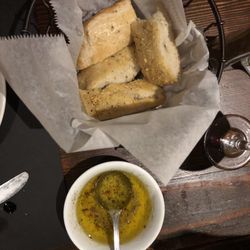 Carmela's Restaurant - Yummy warm focaccia bread with dipping oil.