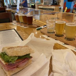 Craft beer flights with an Italian sub.