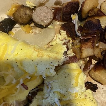 First Watch - Omelet and potatoes (burnt) - Breakfast & Brunch Near Me - Pearland, Texas First Watch - Omelet and potatoes (burnt) - Breakfast & Brunch Near Me - Pearland, Texas