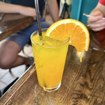 Happenstance Cafe - Mimosa - R Wine Cellar, Bubbly and tangerine mango juice - Coffee & Tea Near Me - Pittsburgh, Pennsylvania