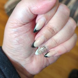 Skyview Nails - Black, medium French tip manicure with a feature white + spiderweb on the ring finger.