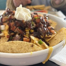 Myers Front Porch - BBQ Brisket Nachos that were made with smoked brisket if you could find it. Mostly BBQ Sauce and Chips.