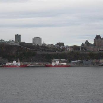 Ville de Levis - A more sweeping view of Quebec City taken in the evening. - Landmarks & Historical Buildings Near Me - Saint-Romuald, Quebec