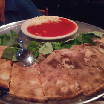 Lucali - Large calzone with shallots. Delicious. - Pizza Near Me - Brooklyn, New York Lucali - Large calzone with shallots. Delicious. - Pizza Near Me - Brooklyn, New York