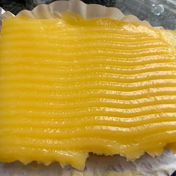 Creighton's American Bakery - I saw this and said wow! That's a big lemon bar!! I must have it! Crust is on thicker side. But so big! - Bakeries Near Me - San Francisco, California
