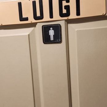 Luigi's Restaurant - a sign on a door - Pizza Near Me - Old Saybrook, Connecticut