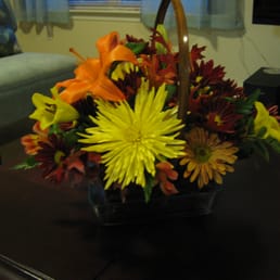 After: overall, the arrangement is less balanced in color and flower type After: overall, the arrangement is less balanced in color and flower type