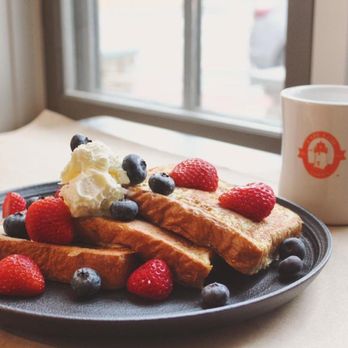 Cape Cod Coffee - a plate of french toast with berries and whipped cream - Coffee & Tea Near Me - Mashpee, Massachusetts