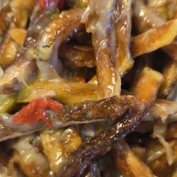 The Art of Snacks - Green chile smothered fries..the green chile sauce is practically a food group.