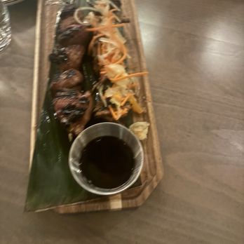 Magna Kainan - One pork and chicken skewer appetizers that they wouldn't bring us rice for. Made us wait for rice, dating rice was a second course - Filipino Near Me - Denver, Colorado