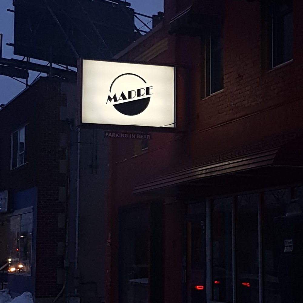 Pizzeria Madre - Can't miss it! (i'm sorry, but do you not love the ambiance in this photo?) - Pizza Near Me - London, Ontario