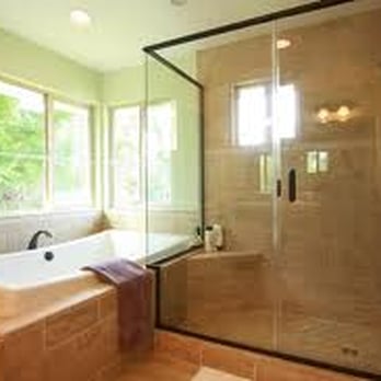 Home Pros - a large bathroom with a walk in shower - General Contractors Near Me Home Pros - a large bathroom with a walk in shower - General Contractors Near Me