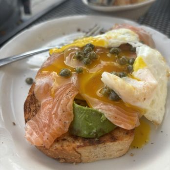 Toast - Toast with cream cheese, capers, cured salmon, egg and avocado - Breakfast & Brunch Near Me - New Orleans, Louisiana Toast - Toast with cream cheese, capers, cured salmon, egg and avocado - Breakfast & Brunch Near Me - New Orleans, Louisiana