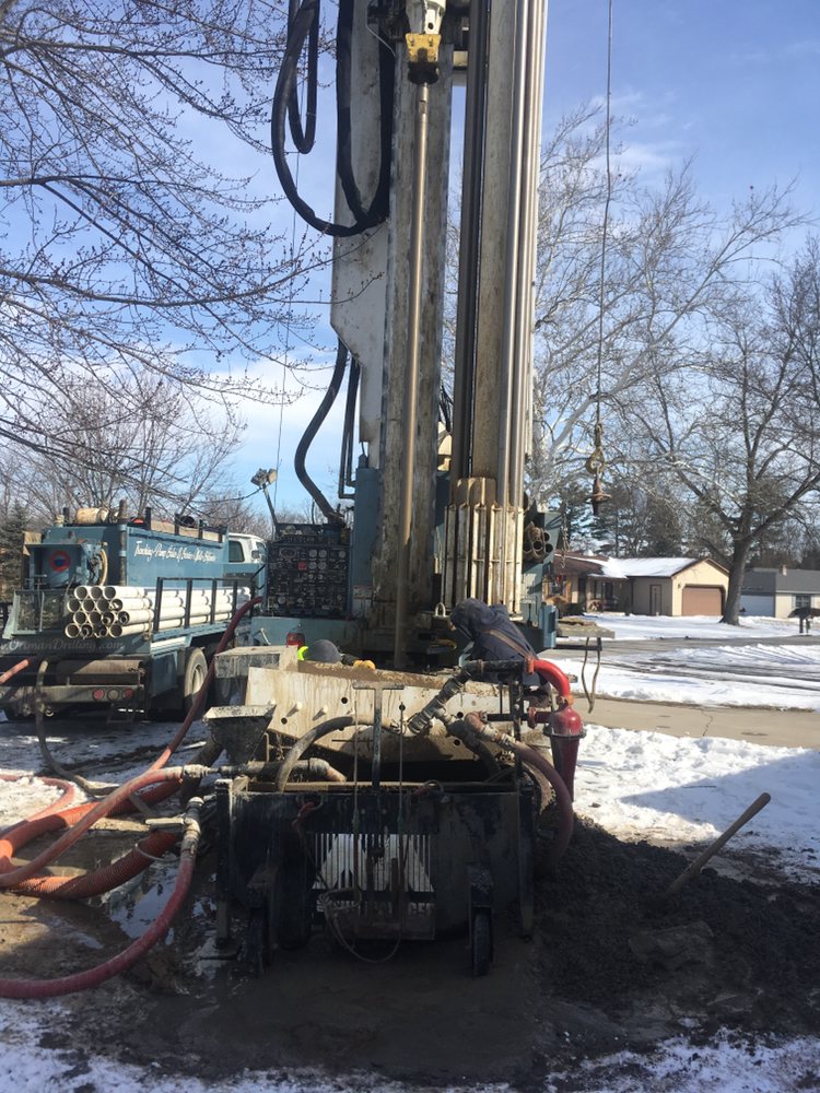 Slide of Hall & Sons Well Drilling