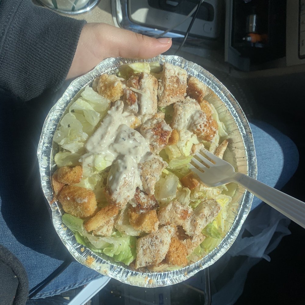 Pizza Palace - a person holding a plate of food - Pizza Near Me - Lake Worth, Florida Pizza Palace - a person holding a plate of food - Pizza Near Me - Lake Worth, Florida
