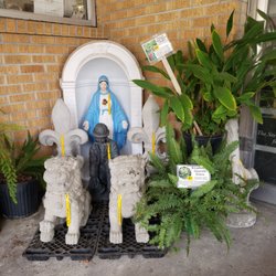 Rose Garden Center - Foo dogs, ferns, an army guy and Virginia Mary--not sure.