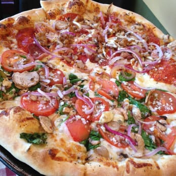 Pizza a'fetta - Half Meat lovers pie / Half Veggie pie w/ Oregon Blue Cheese crumbles - YUM! - Pizza Near Me - Cannon Beach, Oregon Pizza a'fetta - Half Meat lovers pie / Half Veggie pie w/ Oregon Blue Cheese crumbles - YUM! - Pizza Near Me - Cannon Beach, Oregon
