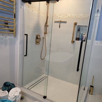 Renaissance Kitchens, Bath & Flooring - Towel warmer and barn door shower - Flooring Near Me - Orange, California Renaissance Kitchens, Bath & Flooring - Towel warmer and barn door shower - Flooring Near Me - Orange, California