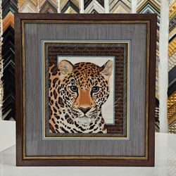 Colibri Art and Framing - We love this Leopard. The frame is pretty great too, and the fabric wrappped mat is next level, but this leopard is the everything.