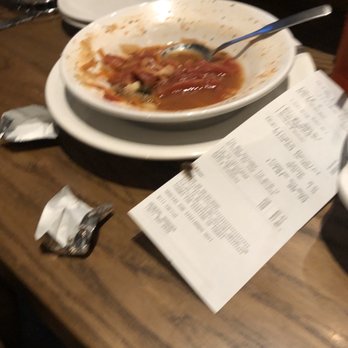 Olive Garden Italian Restaurant - Roach crawling on receipt towards my soup bowl- thank god we were done at this point! - Italian Near Me - Orlando, Florida