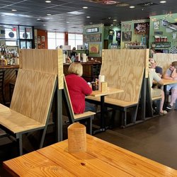 Como Smoke and Fire - Dining room from the back of the restaurant. The plywood seats aren't particularly comfortable, but they aren't terrible either.