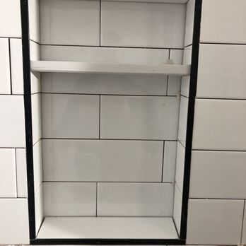 Sino-American General Contracting - a shelf in a bathroom - General Contractors Near Me Sino-American General Contracting - a shelf in a bathroom - General Contractors Near Me