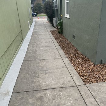 Sandoval Concrete - Walkway after, with slate stamp pattern. The angle is off though- it looks like it's tilted to the left, but it's not. - Masonry/Concrete Near Me Sandoval Concrete - Walkway after, with slate stamp pattern. The angle is off though- it looks like it's tilted to the left, but it's not. - Masonry/Concrete Near Me