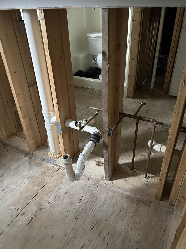 Slide of Imax Plumbing Corporation