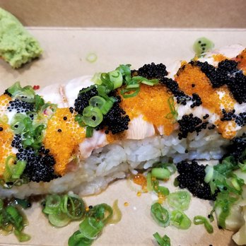 Momiji - Capitol Hill Roll - snow crab mix, avocado & cucumber topped with seared salmon, scallions, tobiko, sweet aioli, sweet chili and soy glaze - Japanese Near Me - Seattle, Washington Momiji - Capitol Hill Roll - snow crab mix, avocado & cucumber topped with seared salmon, scallions, tobiko, sweet aioli, sweet chili and soy glaze - Japanese Near Me - Seattle, Washington